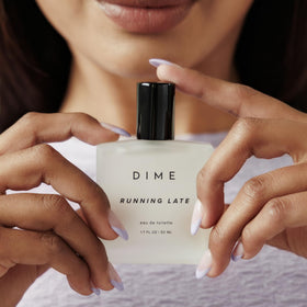 DIME Running Late Perfume 1.7 oz packaging with branding