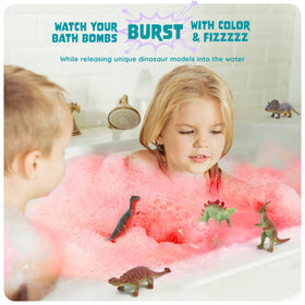Dino Egg Bath Bombs in a bathtub with water fizzing