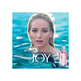 Dior Joy Eau de Parfum 1.7 oz bottle placed on a vanity