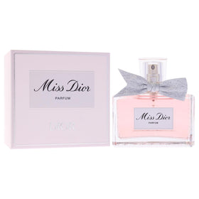 Dior Miss Dior Eau de Parfum 1.7 oz spray with floral background
