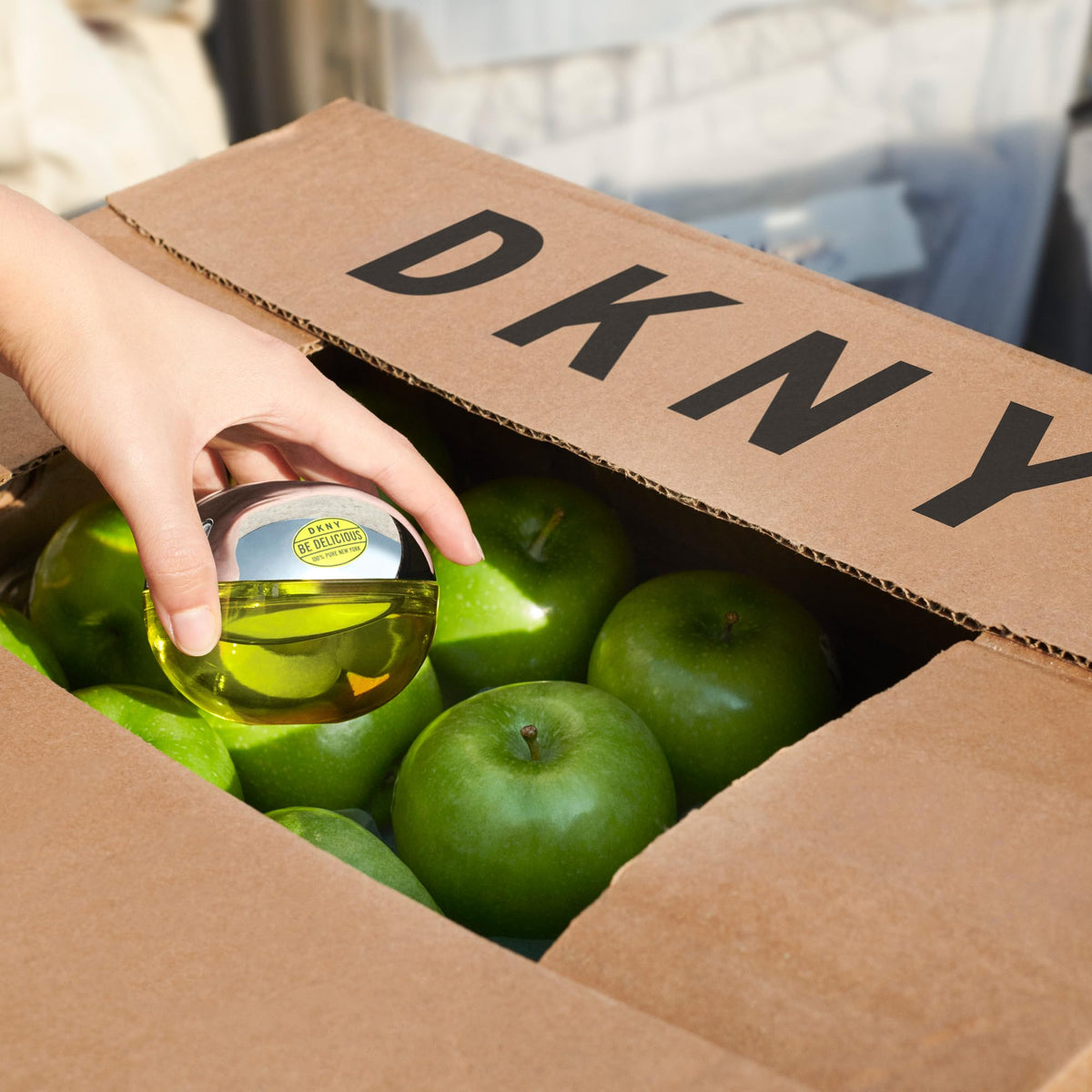 DKNY Be Delicious bottle close-up showing cap