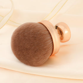 docolor Extra Large Kabuki Body Brush with makeup products