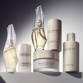 Donna Karan Cashmere Mist Deodorant Stick on a vanity