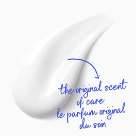 Dove Body Wash displayed with foam and soap bubbles