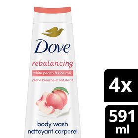 Dove Body Wash with white peach and rice milk on a bathroom shelf