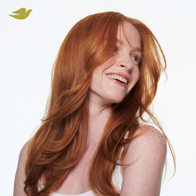 Dove Intensive Repair Conditioner 28oz in a bathroom setting