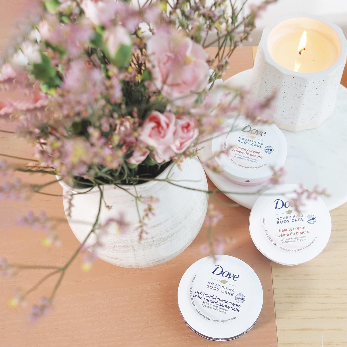 Dove Lotion Beauty Cream packaging with essential oils