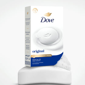 Dove Original Beauty Bar Soap displayed with flowers