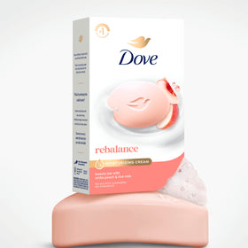 Dove Rebalancing Beauty Bar displaying its smooth finish on skin