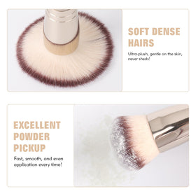 dpolla Dual-Ended Foundation Brush on a makeup vanity with products