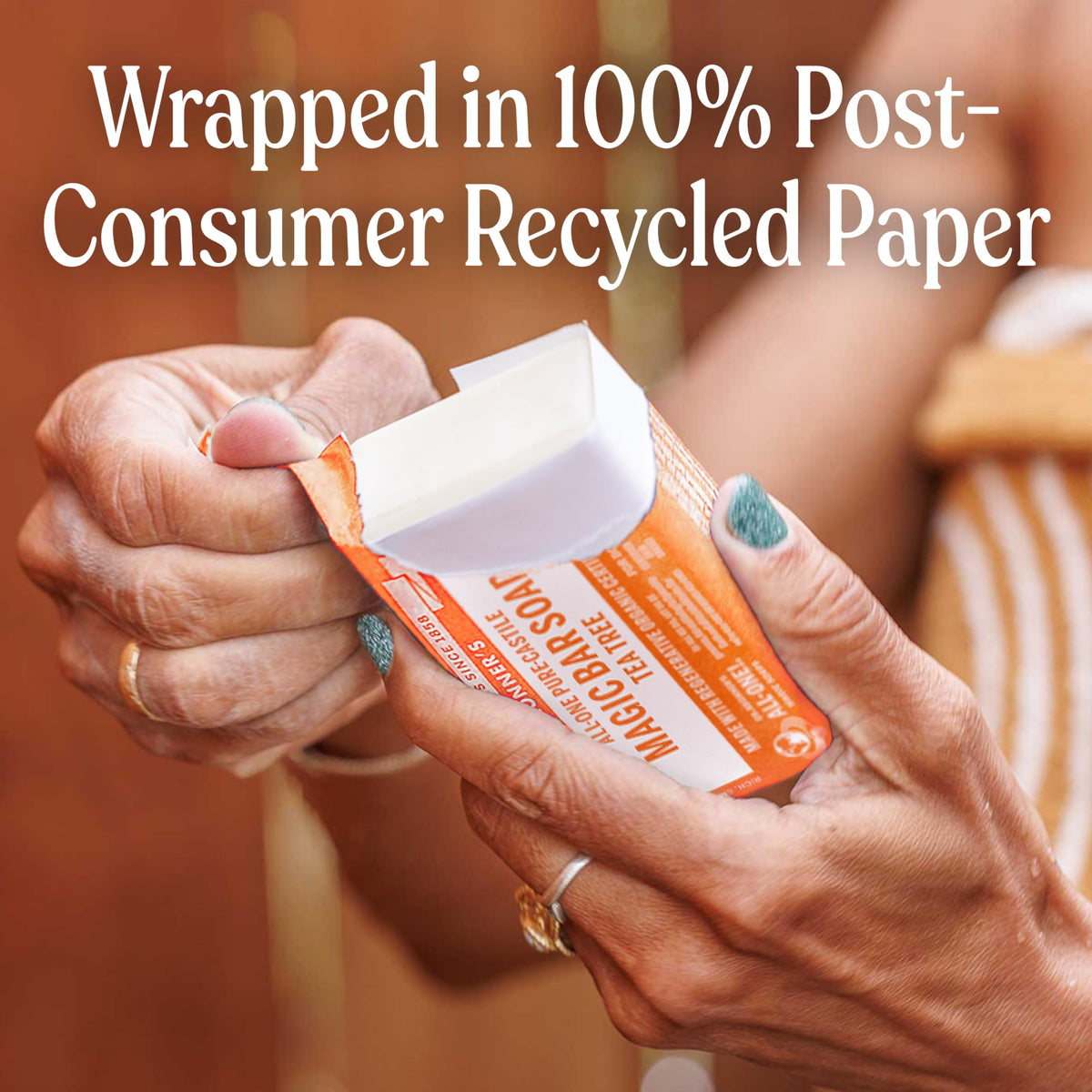 Dr. Bronner's Tea Tree soap being used to wash hands
