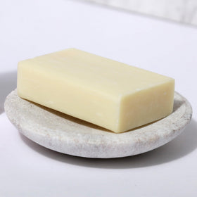 Dr. Natural Castile Bar Soap Lavender on a wooden surface