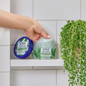 Dr Teal's Epsom Salt Body Scrub in a bathroom setting