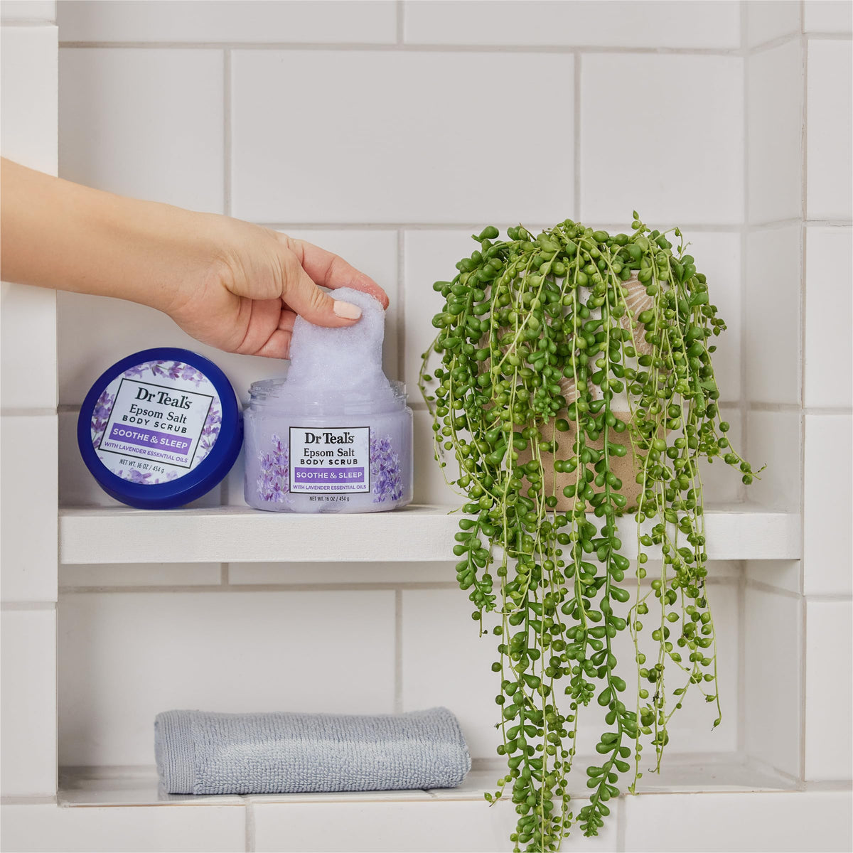 Dr Teal's Epsom Salt Body Scrub in a spa setting