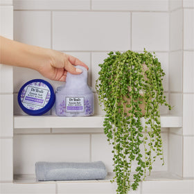 Dr Teal's Epsom Salt Body Scrub in a spa setting
