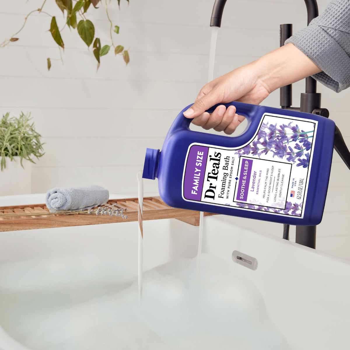 Dr Teal's Foaming Bath displayed with bath accessories