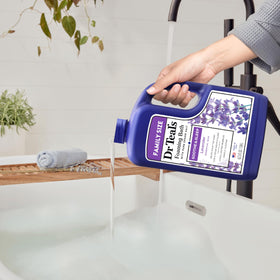 Dr Teal's Foaming Bath displayed with bath accessories