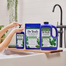Dr Teal's Foaming Bath Relax & Relief in a relaxing bathroom setting