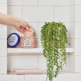 Dr Teal's Pink Himalayan Salt Body Scrub in a bath setting