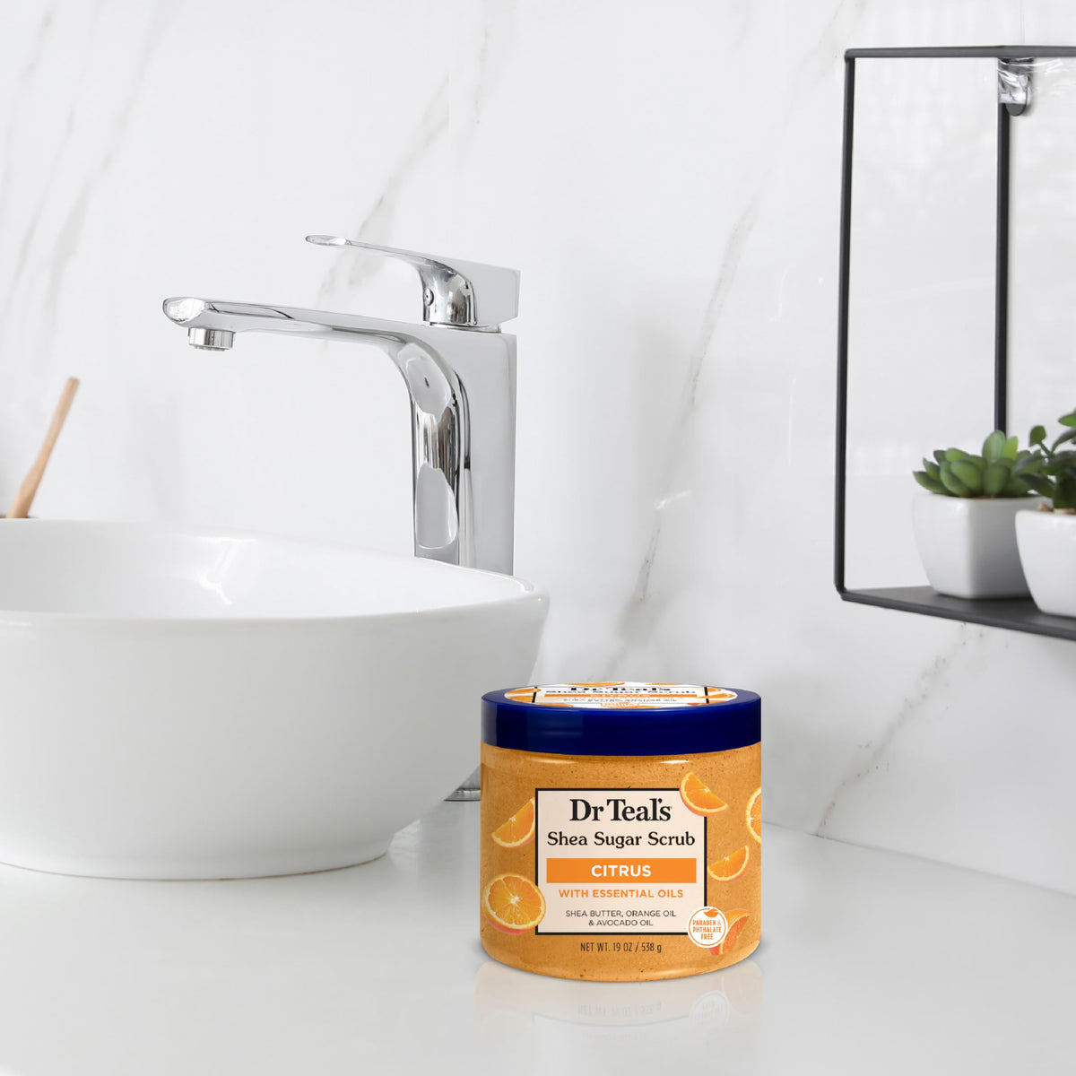 Dr Teal's Shea Sugar Body Scrub Citrus in a bathroom setting