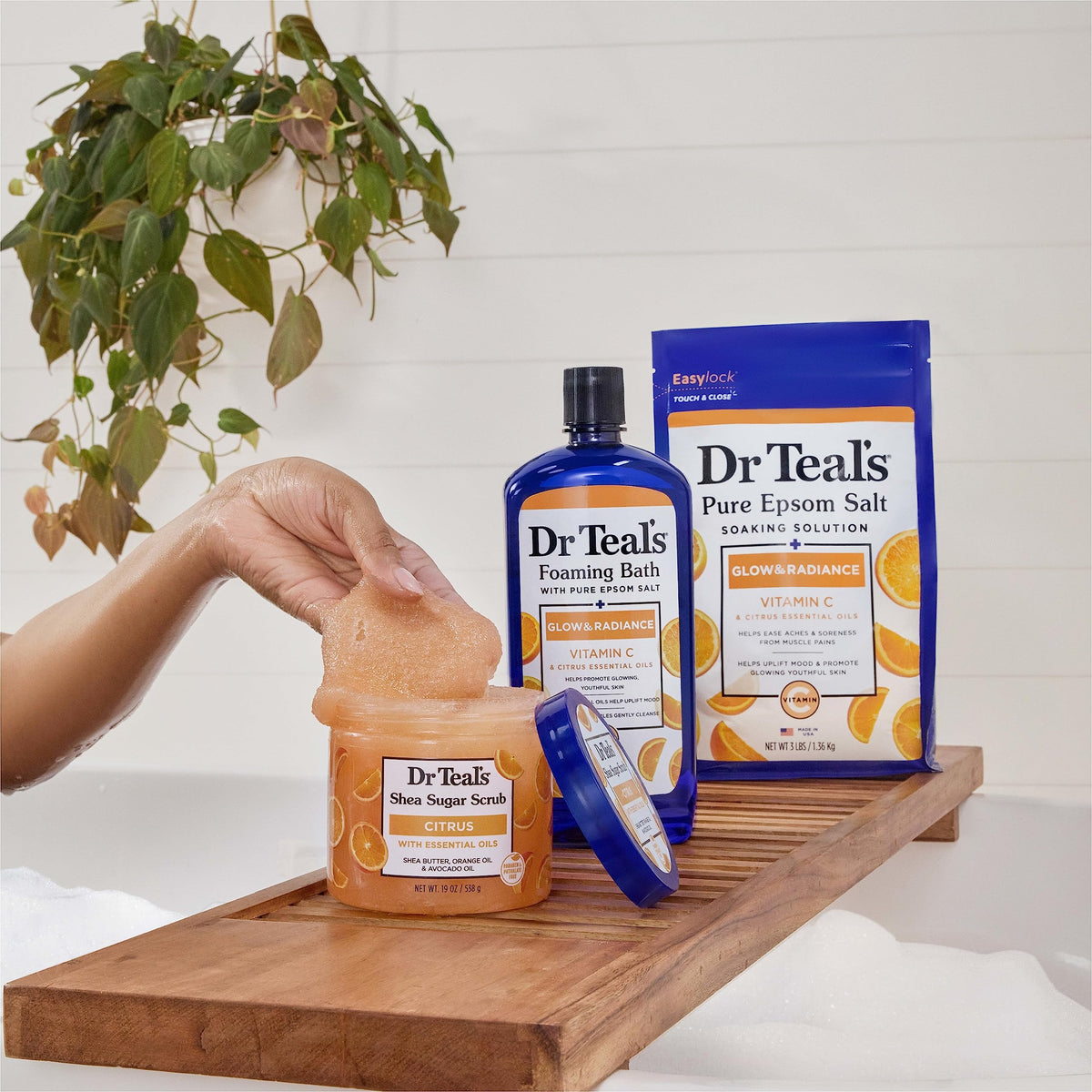 Dr Teal's Shea Sugar Body Scrub Citrus on a wooden surface
