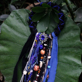 Dreadlock hair tie on a model showcasing its use
