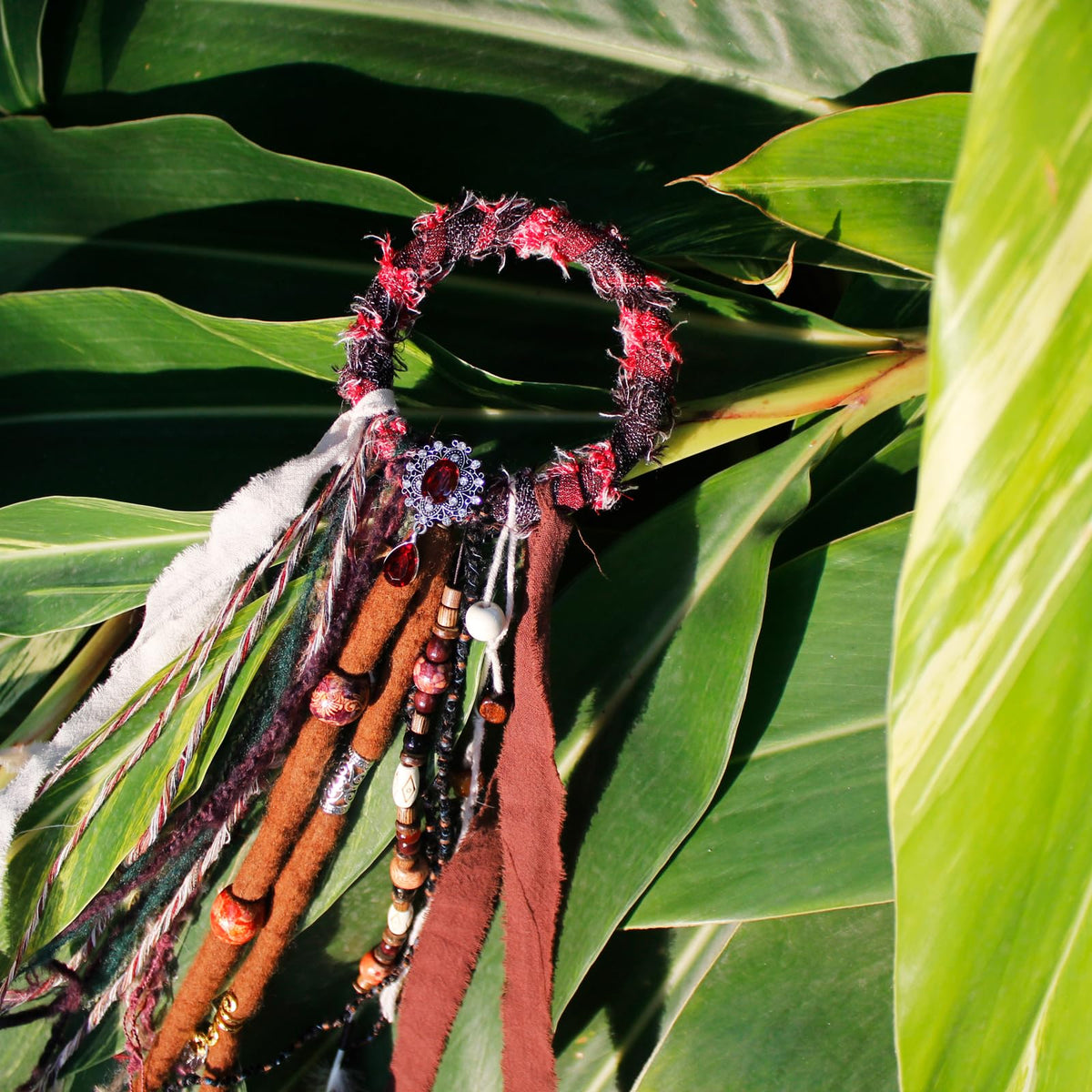Dreadlock hair tie with natural stones and shells