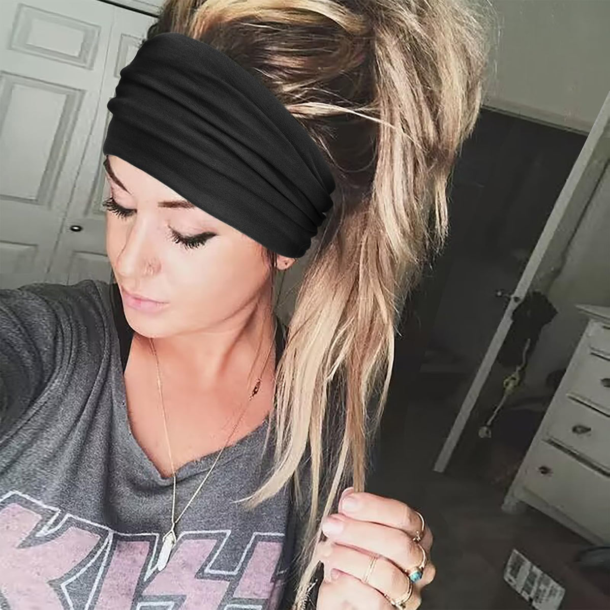 DRESHOW Wide Headband in vibrant colour on a model