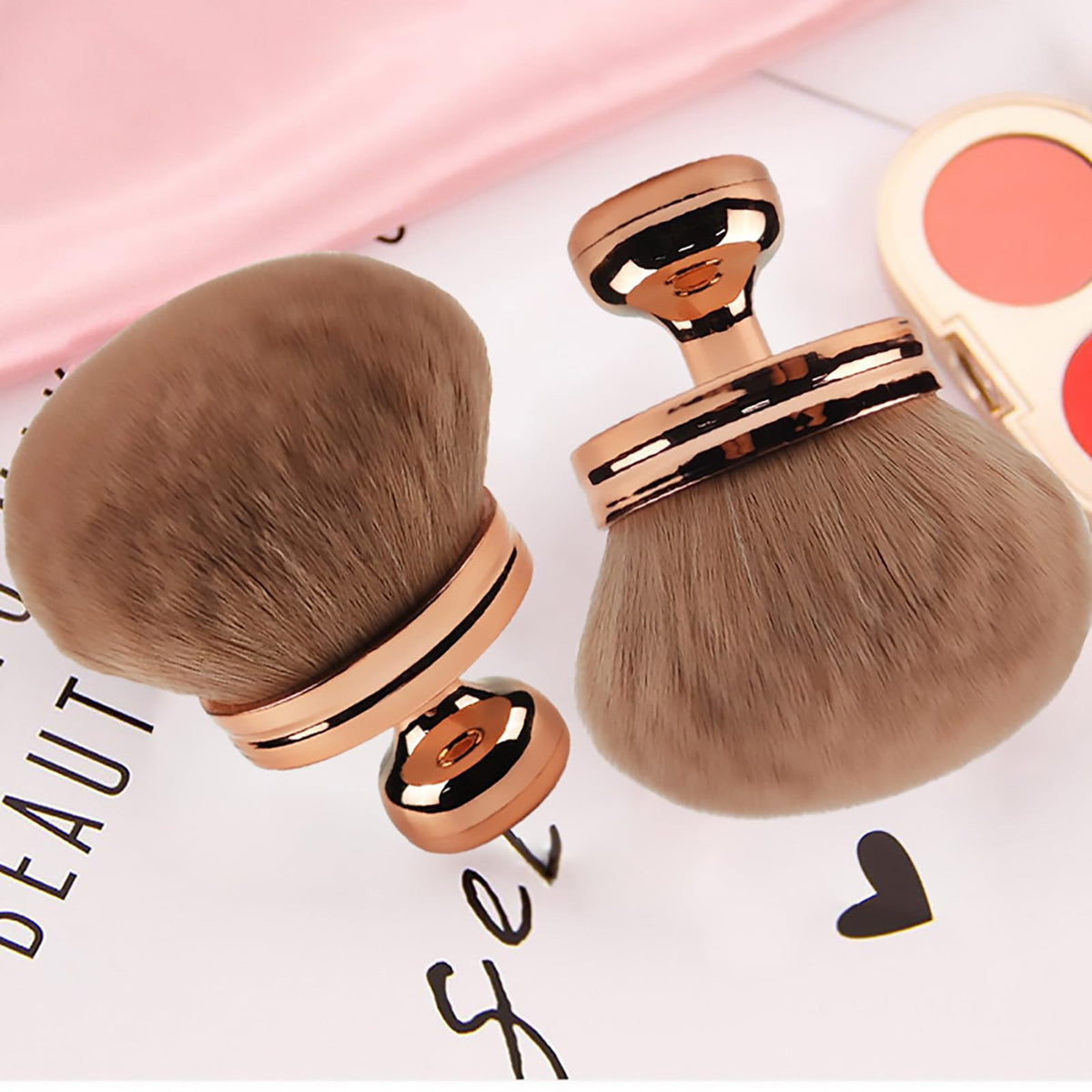 DRIPOO Extra Large Body Makeup Brush displayed on a vanity