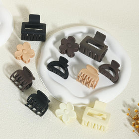 Drnytunk hair clips in beige, khaki, brown, and black