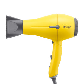 Drybar Baby Buttercup Travel Blow-Dryer with collapsible handle