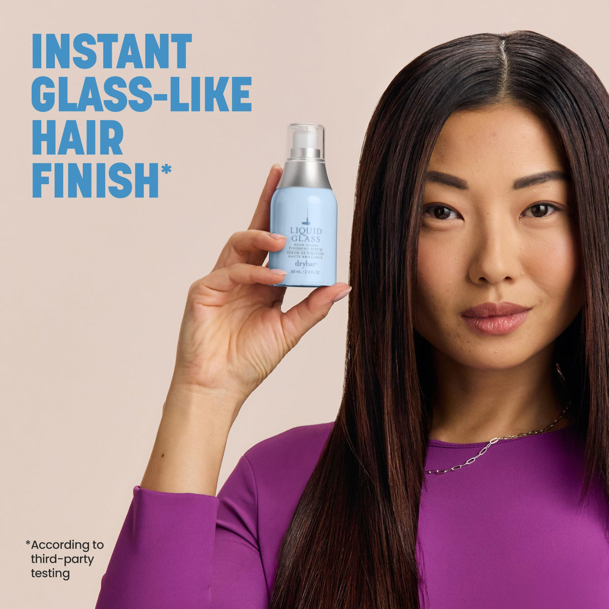 Drybar Liquid Glass Serum with a stylish background