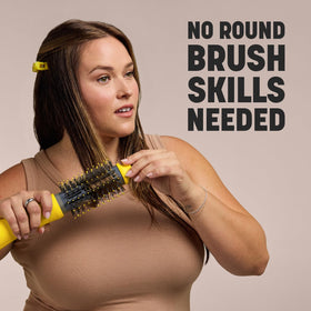 Drybar Triple Shot Blow-Dryer Brush showing temperature settings