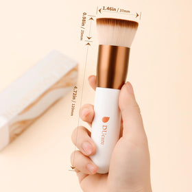 DUcare Foundation Brush Set on a vanity with makeup products