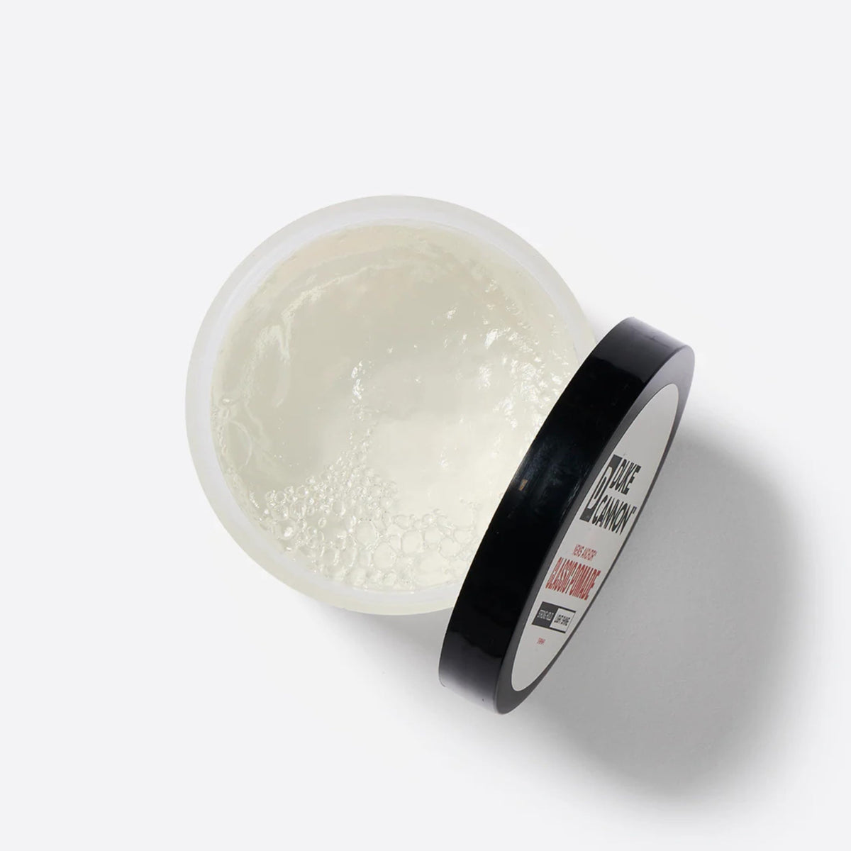 Duke Cannon News Anchor Classic Pomade in use on styled hair