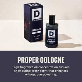 Duke Cannon Proper Cologne Deep Space bottle on a wooden shelf