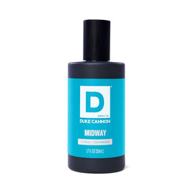 Duke Cannon Proper Cologne Midway on a wooden surface