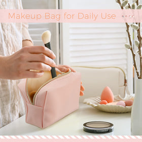 Dunzy makeup bag set displayed with travel essentials