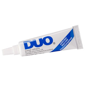 DUO Strip Eyelash Adhesive Clear beside false eyelashes