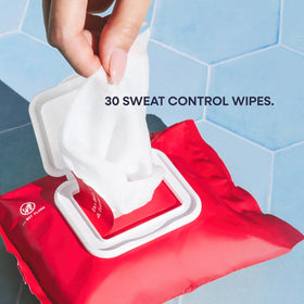Duradry Sweat Control Body Wipes next to workout gear
