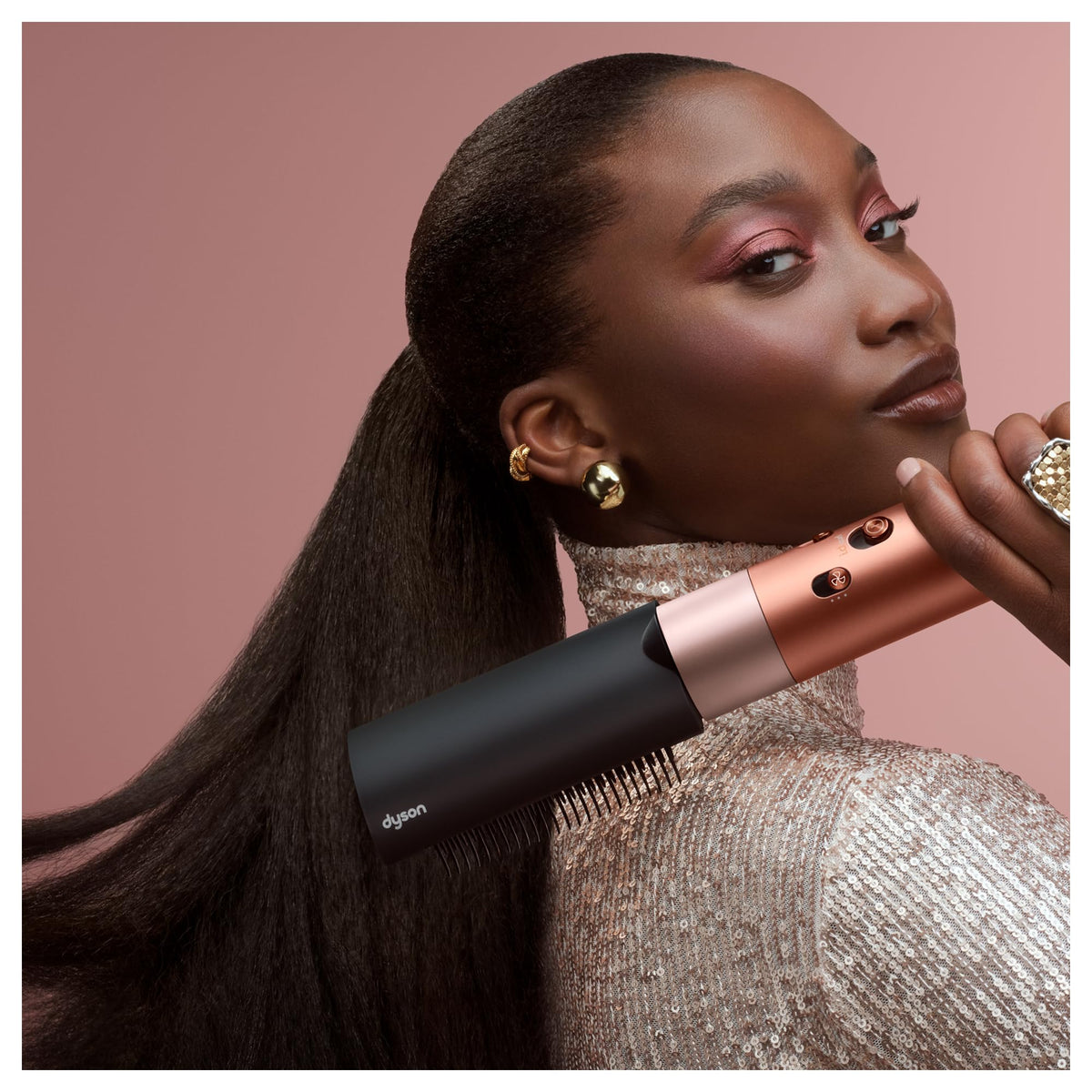 Dyson Airwrap i.d.™ Multi-Styler in use on curly hair