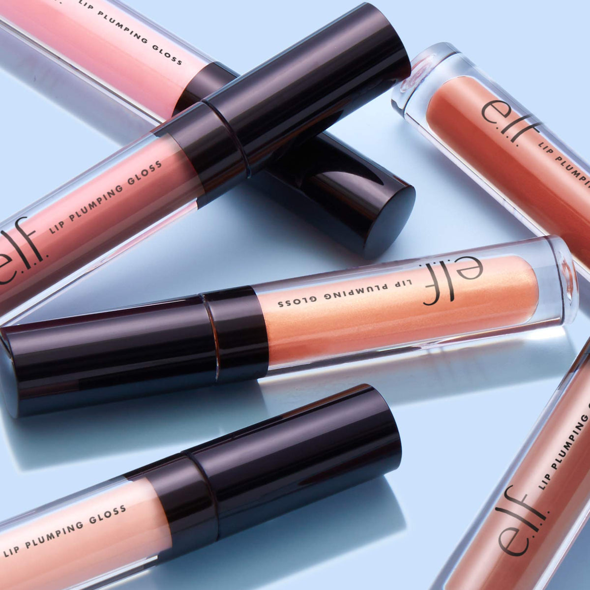 e.l.f. Lip Plumping Gloss Pink Cosmo in natural light