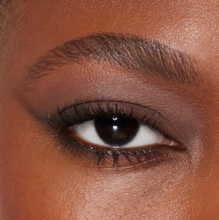 e.l.f. Perfect 10 Eyeshadow Palette in lifestyle setting with makeup brushes