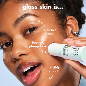 e.l.f. SKIN Glass Slick Serum Stick in hand