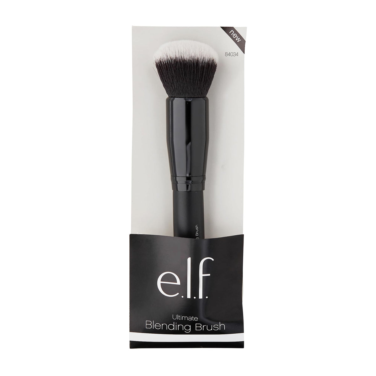 e.l.f. Ultimate Blending Brush in hand for makeup application