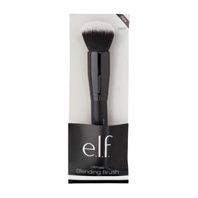e.l.f. Ultimate Blending Brush in hand for makeup application