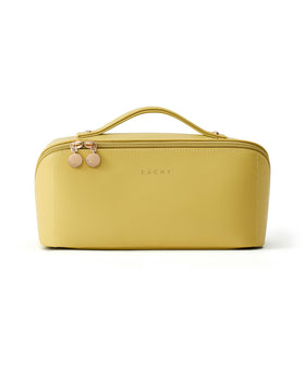 EACHY Travel Makeup Bag green on a bathroom counter