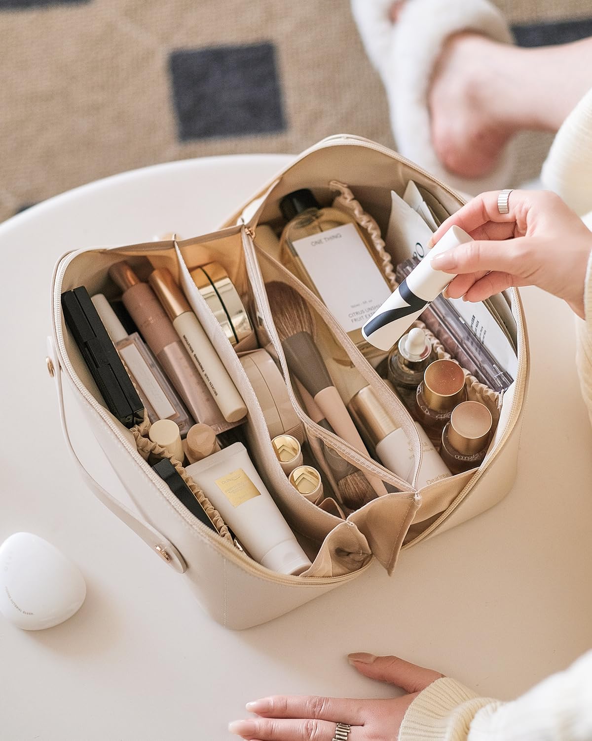 EACHY Travel Makeup Bag with makeup brushes and cosmetics