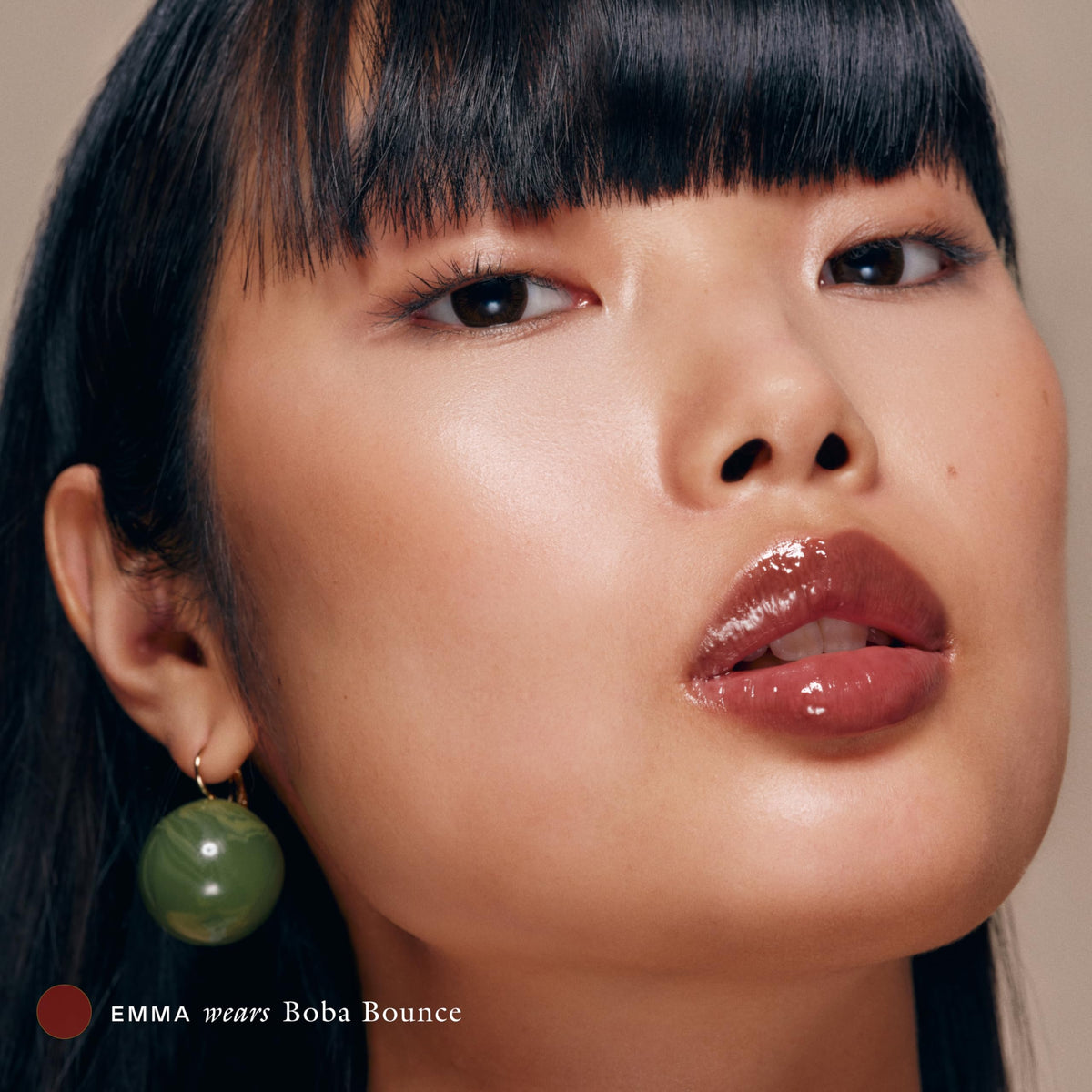 EADEM Tinted Lip Balm Boba Bounce on a vanity