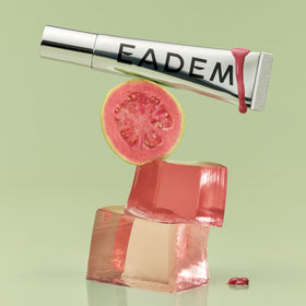 EADEM Tinted Lip Balm Guava Fresca applied on lips